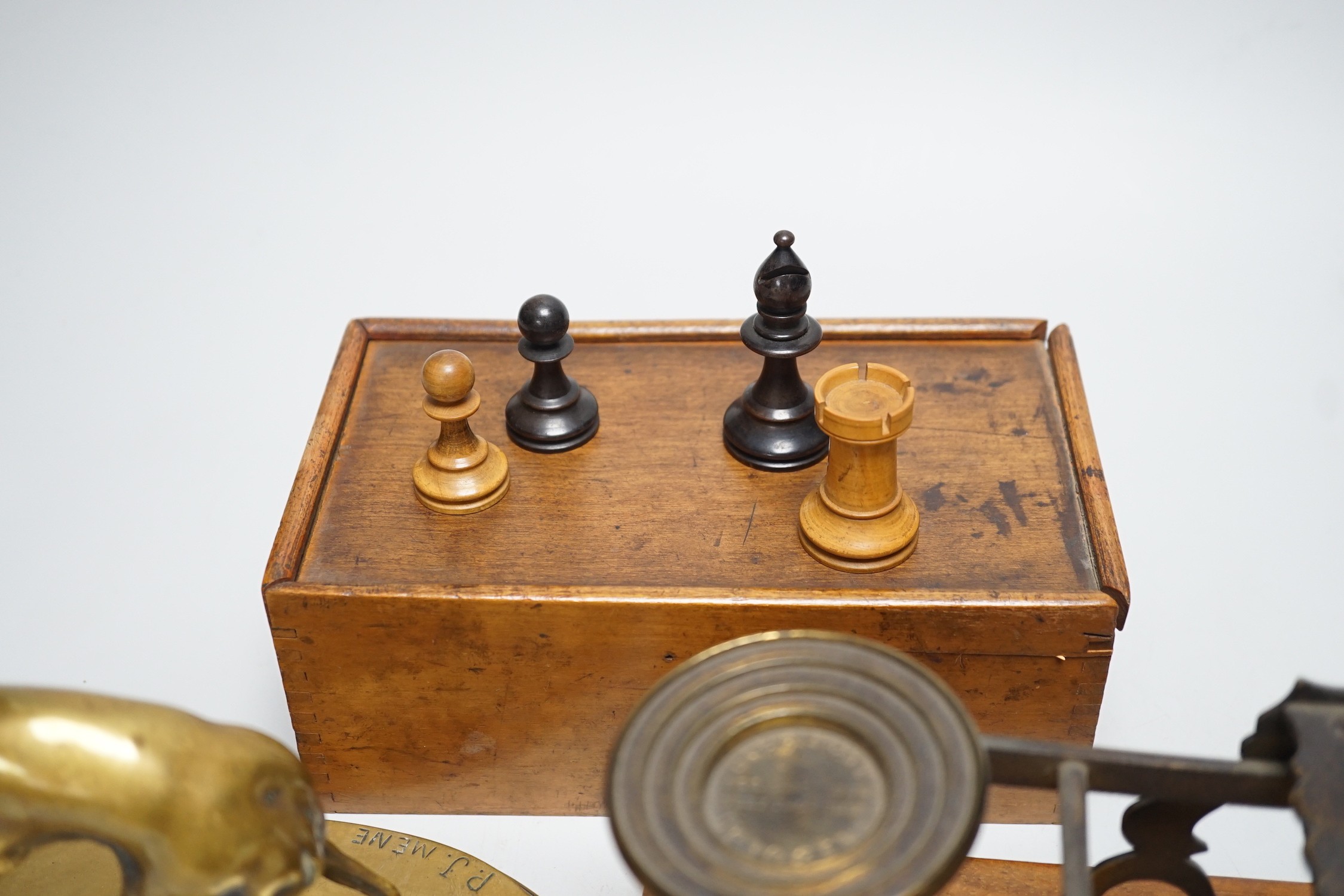 After Mene, a bronze greyhound, a Staunton-pattern chess set and a set of Victorian postal scales, bronze 22cms wide